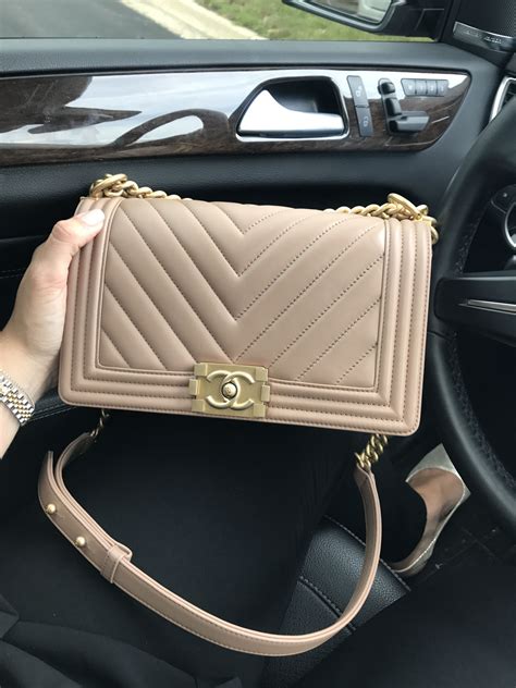 beige chanel chevron bag|Chanel Chevron resale.